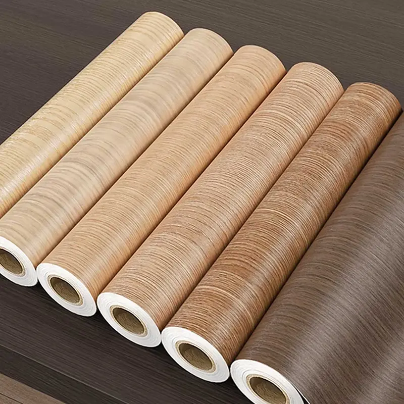 Ka Phetoho ea Lehae ea Eco-Friendly Booming, Hobaneng ha Lifilimi tsa PET/PVC Wood Grain e Fetoha Lithato Tse Ncha Bakeng sa Mokhabiso oa Lehae le Khoebo?